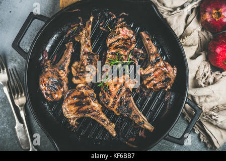 Barbecue dinner with grilled lamb meat chops in pan Stock Photo