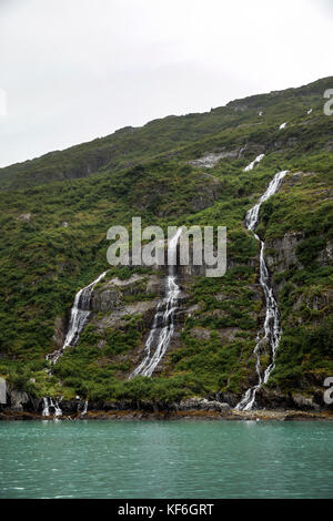 USA, Alaska, Seward, waterfalls spotted near Holgate Glacier seen while exploring Resurrection Bay Stock Photo