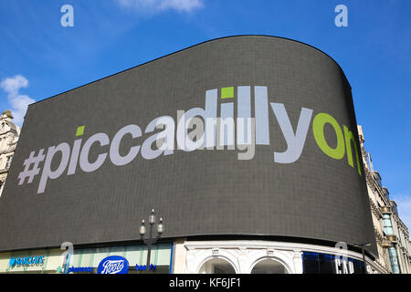 Piccadilly Circus. London, UK. 25th Oct, 2017. New Piccadilly Circus Billboard under blue skies on a warm and sunny autumn day. The new 790-square-metre digital screen in Piccadilly Circus will be fully functioning on Thursday 26 October 2017 after nine months of upgrade. The screens are larger than three tennis courts, packing in almost 11 million pixels at a resolution that's greater than 4K. The display is the largest of its kind in Europe. Credit: Dinendra Haria/Alamy Live News Stock Photo
