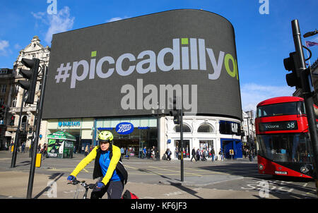 Piccadilly Circus. London, UK. 25th Oct, 2017. New Piccadilly Circus Billboard under blue skies on a warm and sunny autumn day. The new 790-square-metre digital screen in Piccadilly Circus will be fully functioning on Thursday 26 October 2017 after nine months of upgrade. The screens are larger than three tennis courts, packing in almost 11 million pixels at a resolution that's greater than 4K. The display is the largest of its kind in Europe. Credit: Dinendra Haria/Alamy Live News Stock Photo