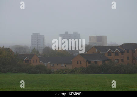 London, UK. 26th Oct, 2017. UK Weather- People on their way to work in New Cross with heavy fog. Credit: Sebastian Remme/Alamy Live News Stock Photo