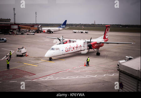 Berlin, Germany. 26th Oct, 2017. A Dash 8-Q 400 airplane of the bankrupt airline Air Berlin pictured at Tegel Airport in Berlin, Germany, 26 October 2017. Credit: Sophia Kembowski/dpa/Alamy Live News Stock Photo