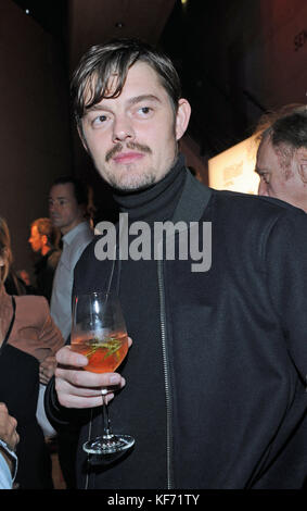 Munich, Germany. 26th Oct, 2017. British actor Sam Riley and German ...