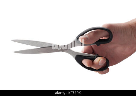 Hand with scissors on isolated white background. Stock Photo