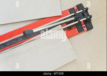 Large Manual Cutter For Ceramic Tiles and cut tiles Stock Photo