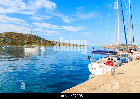 PRIMOSTEN PORT, CROATIA - SEP 5, 2017: Sailing boats mooring in Primosten port, Dalmatia, Croatia. Stock Photo