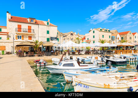 PRIMOSTEN, CROATIA - SEP 5, 2017: fishing boats anchoring in Primosten port, Dalmatia, Croatia. Stock Photo