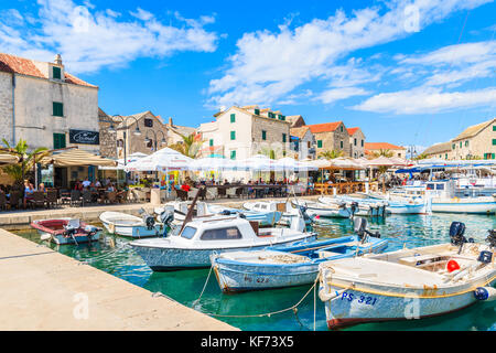 PRIMOSTEN, CROATIA - SEP 5, 2017: fishing boats anchoring in Primosten port, Dalmatia, Croatia. Stock Photo