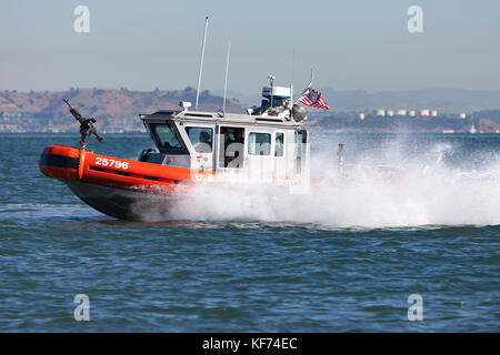 A Coast Guard MSST in a Defender-class boat, aka Response Boat – Small (RB-S), enroute to their patrol position on San Francisco Bay during 2017 Fleet Stock Photo