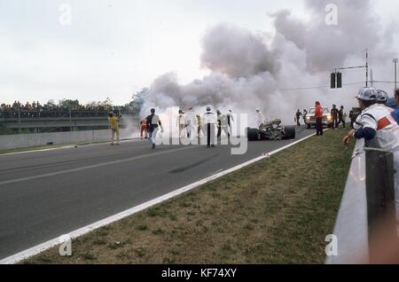 Fatal accident at the 1982 Canadian Grand Prix takes the life of Riccardo Paletti at the start of the race. Palettis' race car rear ended the Ferrari of Didier Pironi, trapping him in the car. Crews extricated Paletti and air lifted him to hospital where he passed away. Stock Photo