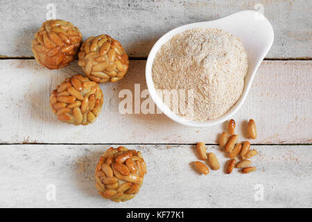 Preparing some typical Spanish pastry "panellets" in Catalonia at All Saint's Day. Empty copy space for Editor's content. Top view. Stock Photo