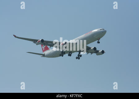 CHIANGMAI THAILAND - DECEMBER 2 2008: HB-JMI Airbus A340-300 of Swissair, Landing to Chiangmai airport from Zurich . Stock Photo