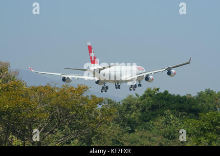 CHIANGMAI THAILAND - DECEMBER 2 2008: HB-JMI Airbus A340-300 of Swissair, Landing to Chiangmai airport from Zurich . Stock Photo