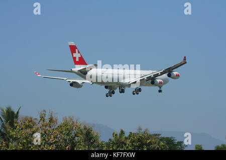 CHIANGMAI THAILAND - DECEMBER 2 2008: HB-JMI Airbus A340-300 of Swissair, Landing to Chiangmai airport from Zurich . Stock Photo