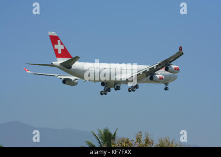 CHIANGMAI THAILAND - DECEMBER 2 2008: HB-JMI Airbus A340-300 of Swissair, Landing to Chiangmai airport from Zurich . Stock Photo