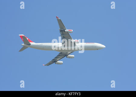 CHIANGMAI THAILAND - DECEMBER 2 2008: HB-JMI Airbus A340-300 of Swissair, Take off from Chiangmai airport to Singapore. Stock Photo