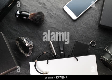 Frame on a gray background, phone and watch, gift boxes horizontal Stock Photo