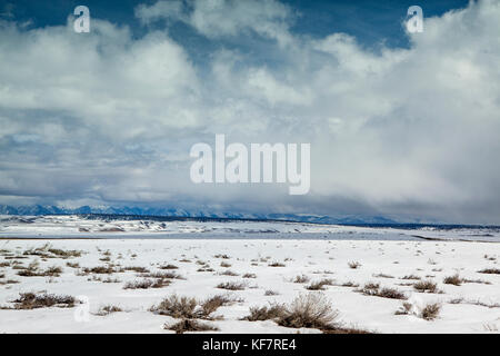 USA, California, Mammoth, cloud covered mountain range surround the road out to the Mammoth Hot Springs Stock Photo