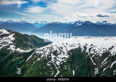 USA, Alaska, Juneau, ariel views of the beautiful Alaskan scenery seen from helicopter, the Helicopter Dogsled Tour flies you over the Taku Glacier to Stock Photo