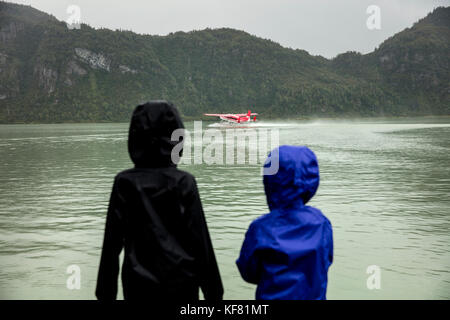 USA, Alaska, Redoubt Bay, Big River Lake, heading out on the dock to take the boat to Wolverine Cove Stock Photo