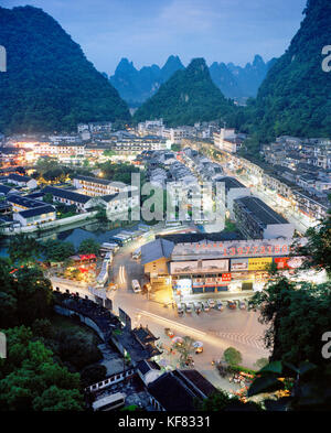 CHINA, Guilin, elevated view of Guilin and limestone spires at dusk Stock Photo