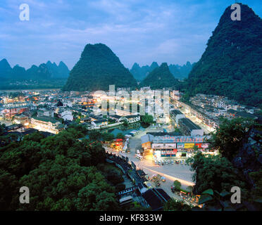 CHINA, Guilin, elevated view of Guilin and limestone spires at dusk Stock Photo