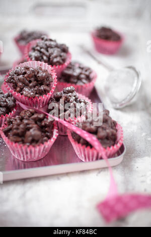 Rice crispies covered with milk chocolate Stock Photo