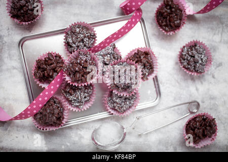 Rice crispies covered with milk chocolate Stock Photo