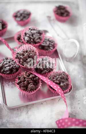 Rice crispies covered with milk chocolate Stock Photo