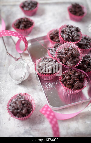 Rice crispies covered with milk chocolate Stock Photo