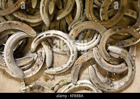 USA, Wyoming, Encampment, a pile of old worn horseshoes at Abara Ranch Stock Photo