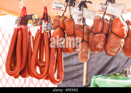 Traditional Majorcan Sobrassada sausage (Sobrasada de Mallorca) for sale at Sineu market, Mallorca, Spain Stock Photo