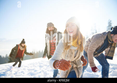 Friends enjoying themselves during winter time Stock Photo
