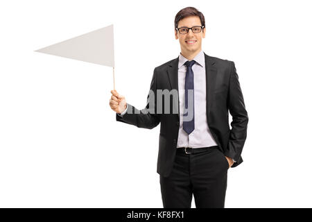 Young businessman holding a white flag isolated on white background Stock Photo