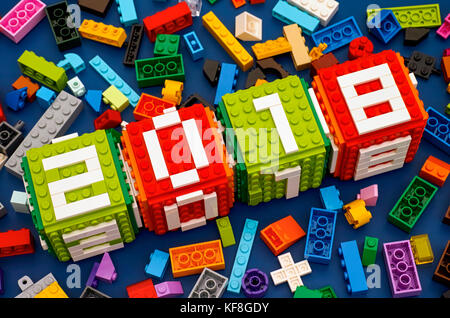Tambov, Russian Federation - September 28, 2017 Lego New year 2018 concept. Lego cubes  with numbers 2 0 1 8 on blue background with some Lego bricks. Stock Photo