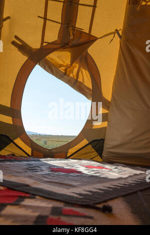 USA, Nevada, Wells, inside of the Luxury Tipis offered at Mustang Monument, A sustainable luxury eco friendly resort and preserve for wild horses, Sav Stock Photo