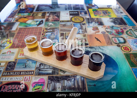 USA, Oregon, Ashland, a sample of beers brewed at the Caldera Brewery and Restaurant which includes lawnmower lager, dry hop orange, dry hop red, doup Stock Photo