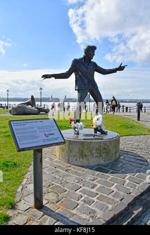 Liverpool waterfront sculpture of Billy Fury by Tom Murphy and information panel provided by Museum of Liverpool River Mersey & Birkenhead beyond UK Stock Photo