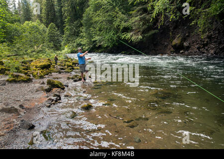 USA, Oregon, Santiam River, Brown Cannon, a man fishing along the Santiam River in the Willamete National Forest Stock Photo