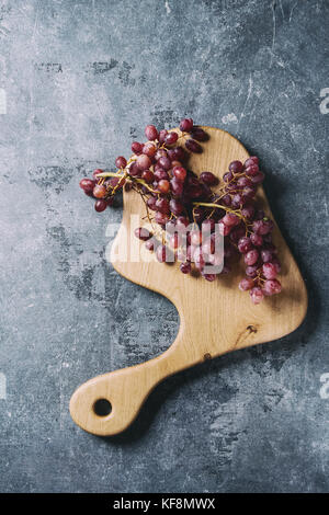 Grapes on serving board Stock Photo