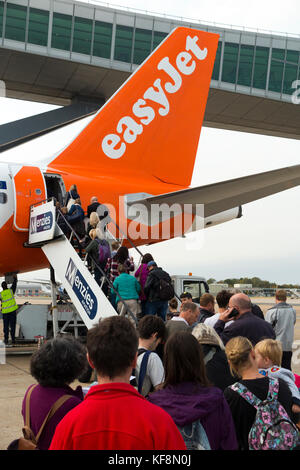 An Easyjet aircraft Airbus A320-214 / flight boarding passengers at London Gatwick Airport, UK. (91) Stock Photo