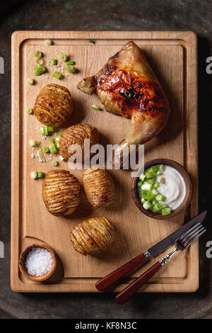 Accordion baked potatoes Stock Photo