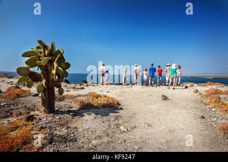 GALAPAGOS ISLANDS, ECUADOR, individuals exploring around South Plaza Island off the SE coast of Santa Cruz Stock Photo