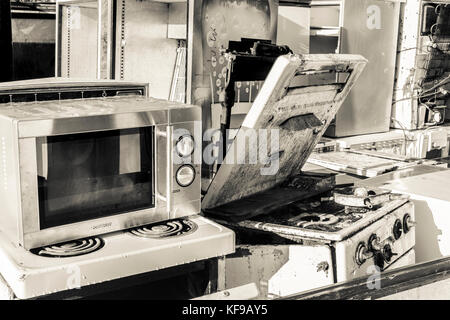 Broken electrical and white goods in recycling center, Ireland Stock Photo