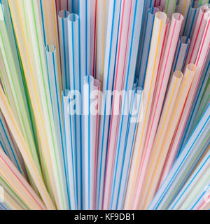 A close-up of a collection of colourful drinking straws. Stock Photo