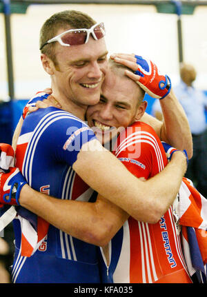 Mark Cavendish of Great Britain, right, hugs his teammate  Robert Hayles after they won the men's madison race at the UCI Track Cycling World Championships in Carson, Calif. on Sunday, March 27, 2005.  Photo by Francis Specker Stock Photo