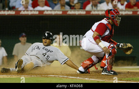 Chicago White Sox catcher Carlos Perez and second baseman Josh Harrison  celebrate the team's 3-2 win over the Minnesota Twins after a baseball game  Monday, Oct. 3, 2022, in Chicago. (AP Photo/Charles