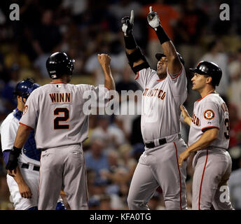 San Francisco Giants pitcher Randy Johnson greets his son, Tanner, after he  achieved his 300th career win after the game against the Washington  Nationals at Nationals Park in Washington on June 4