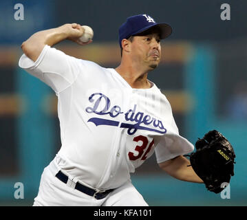 Los Angeles Dodgers' Greg Maddux pitches against the Cincinnati Reds during the first inning of a baseball game in Los Angeles on Wednesday, Aug. 30, 2006. Photo by Francis Specker Stock Photo