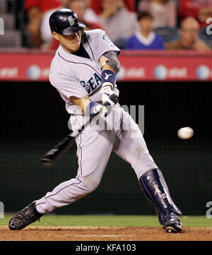 Seattle Mariners' Kenji Johjima of Japan hits a RBI-double off Los Angeles Angels pitcher Scot Shields in the ninth inning of a baseball game in Anaheim, Calif., on Thursday, Aug. 17, 2006. The Angels won 5-2. Photo by Francis Specker Stock Photo